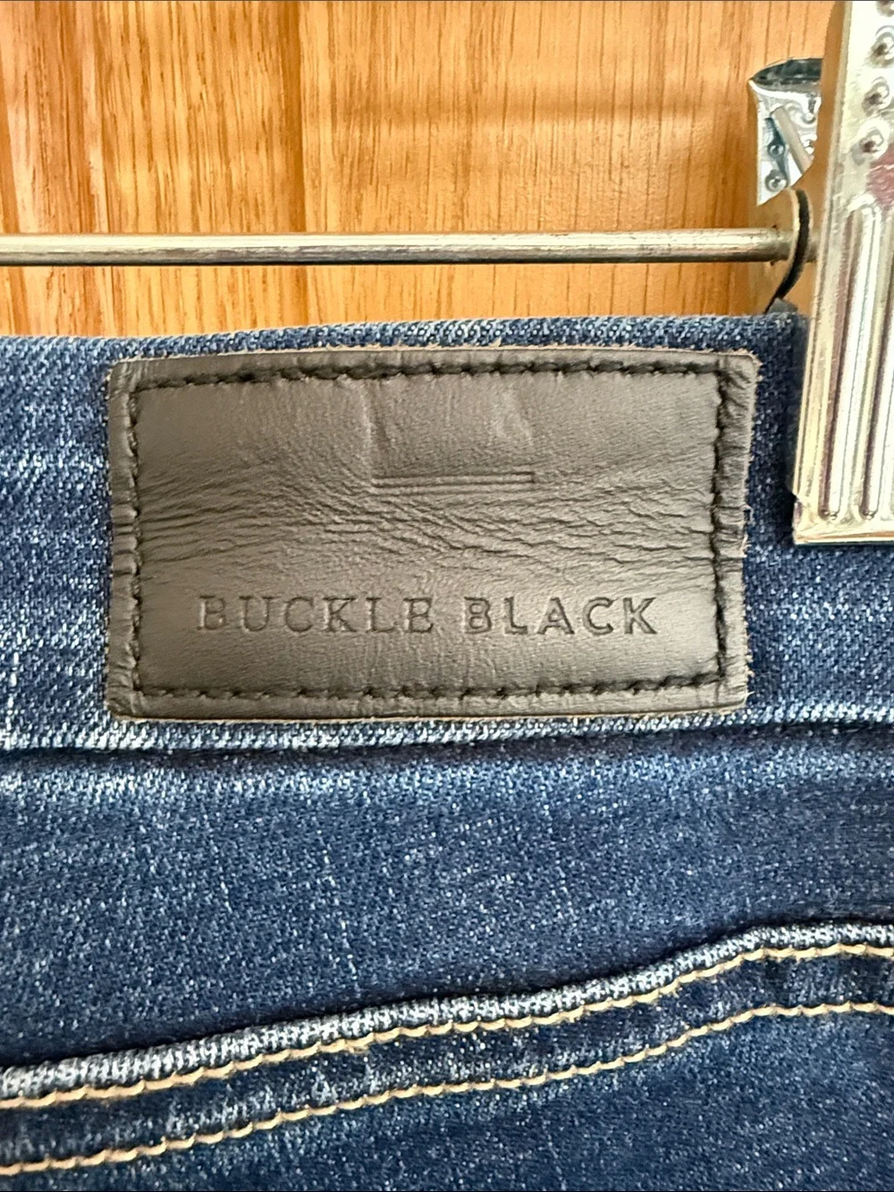 Buckle Black Dark Indigo Denim Jeans with Black Logo Patch